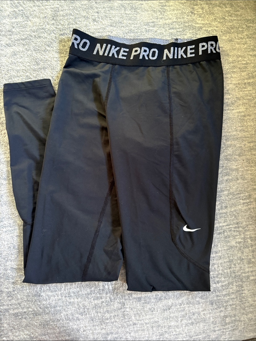 Nike Black Kids Performance Leggings with White Swoosh